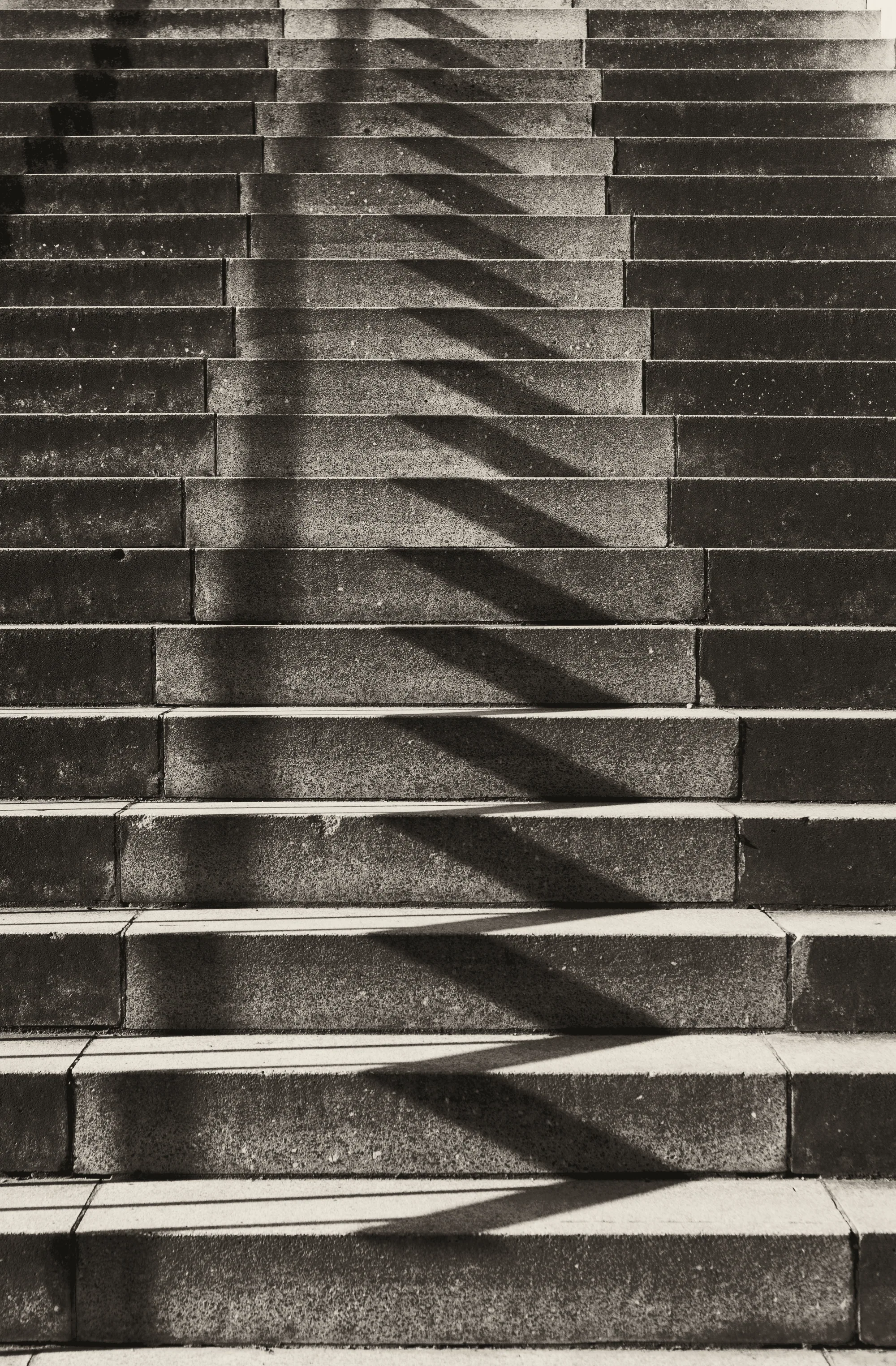 Concrete steps crossed by diagonal light